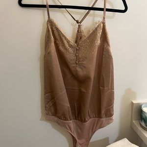 pink lily beige bodysuit
